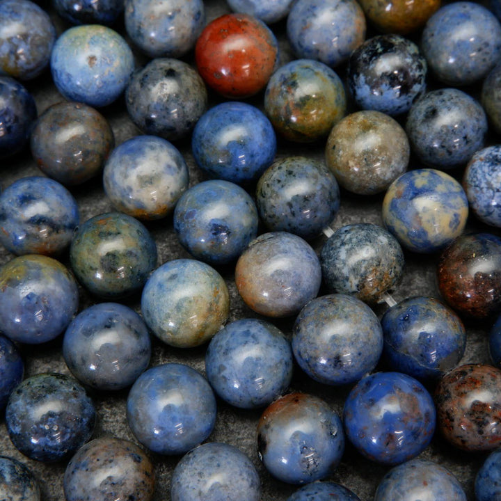 Mixed blue and red sunset dumortierite beads.