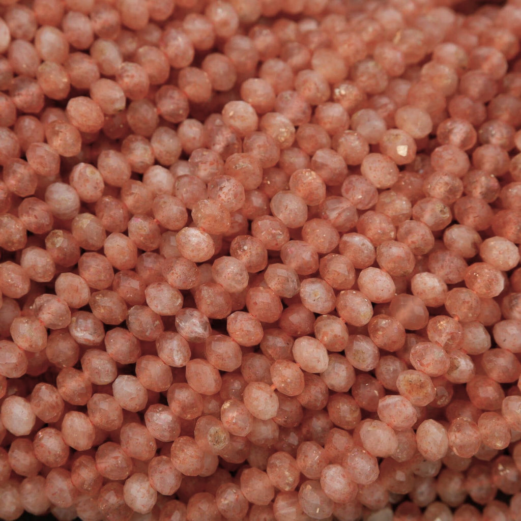 Close-up of pinkish-orange beads