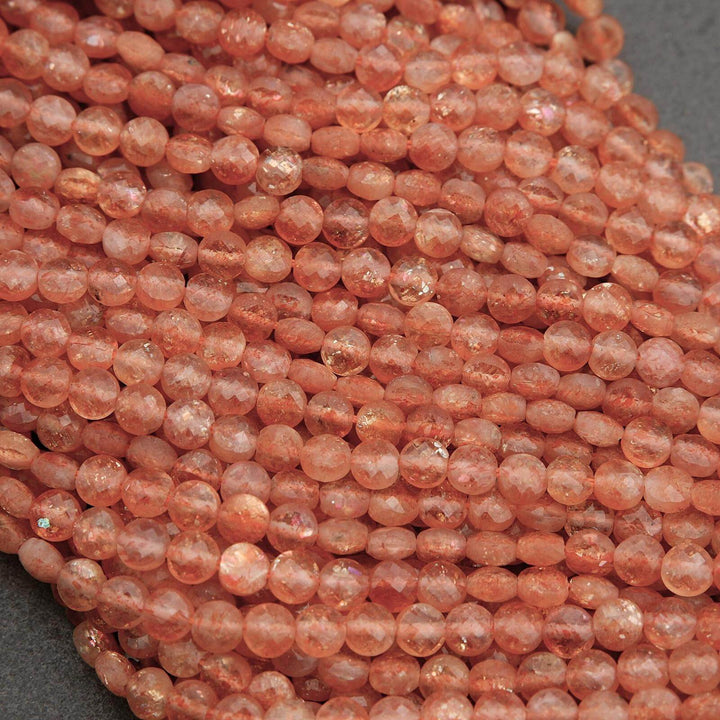 Close-up of pink beads on a gray surface