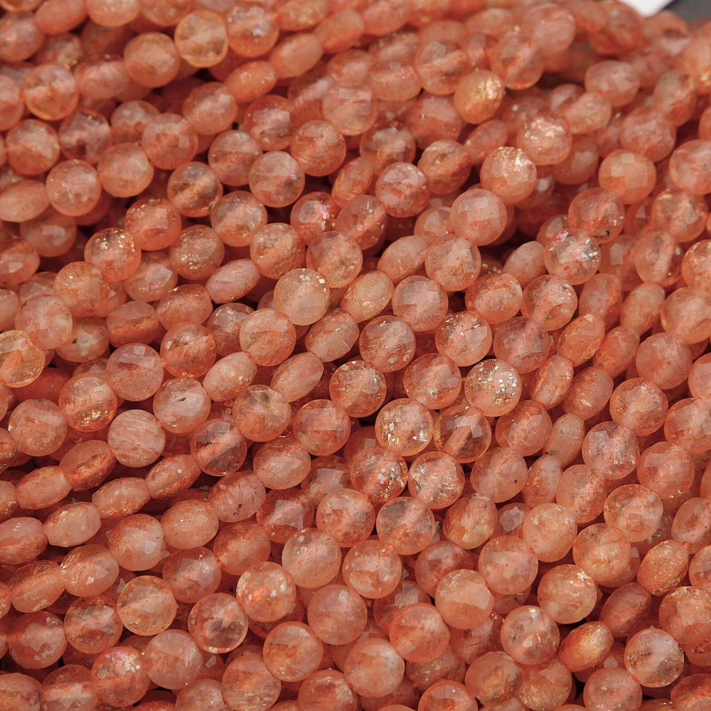 Close-up of pinkish-orange beads