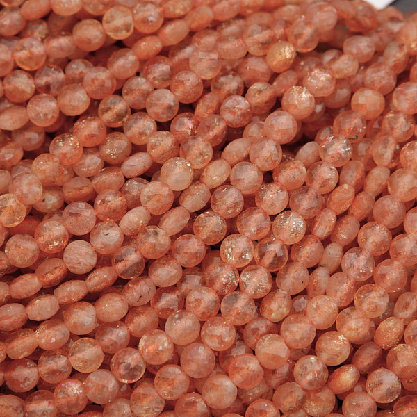 Close-up of pinkish-orange beads