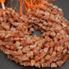 Orange sunstone beads.