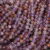 Close-up of purple and brown beads