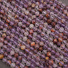 Close-up of multicolored beads arranged in a pattern