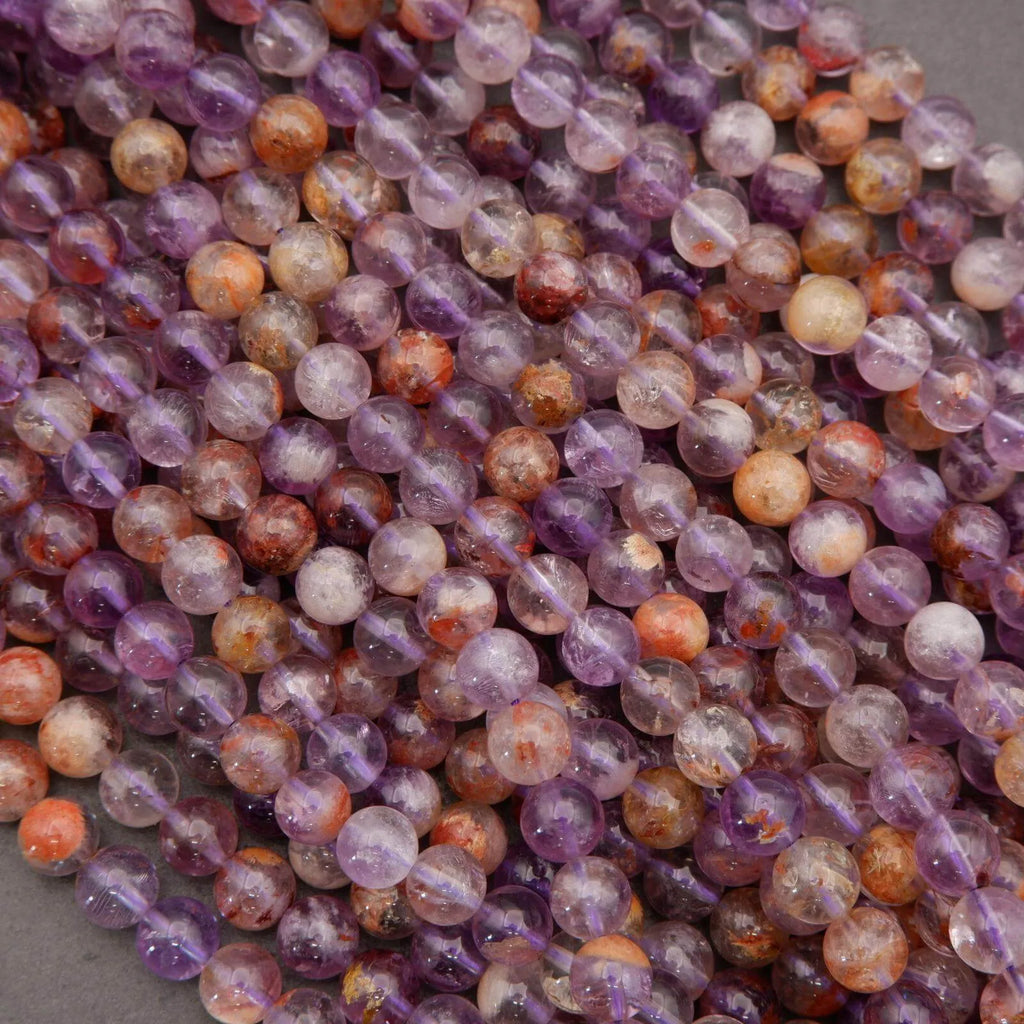 Close-up of multicolored beads on a gray background