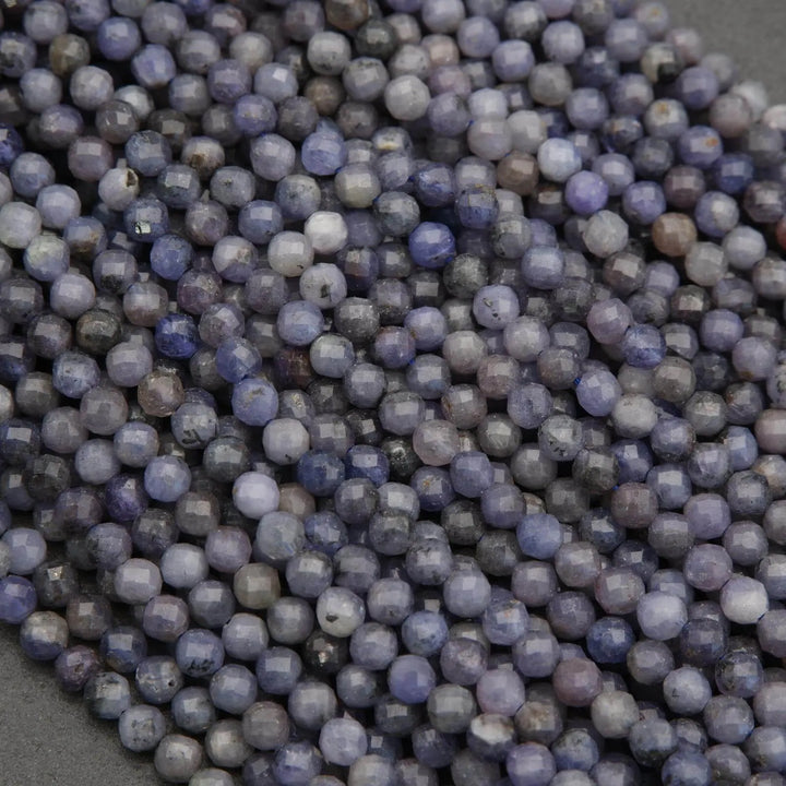 Close-up of purple beads on a dark background
