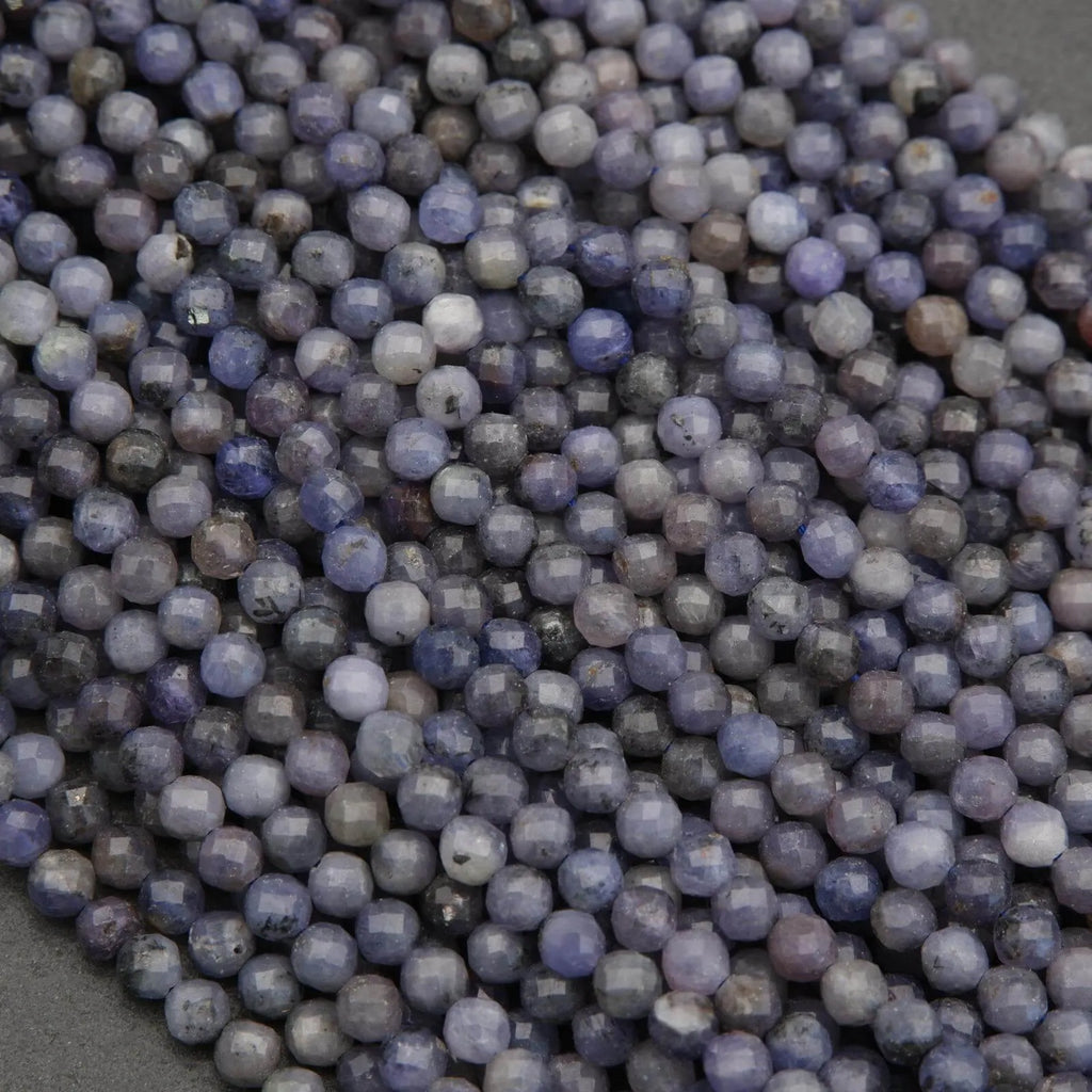 Close-up of purple beads on a dark background
