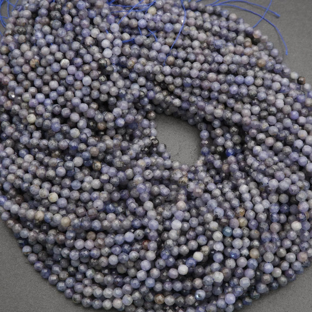 String of blue beads on a gray background