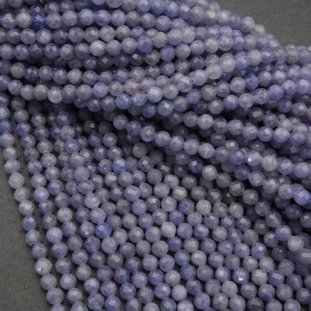 Close-up of purple beads on a dark background