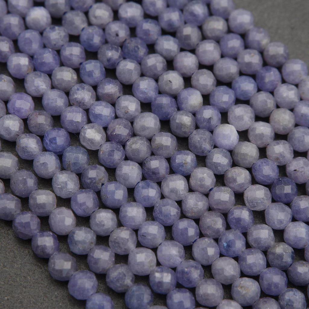 Close-up of purple beads on a dark background