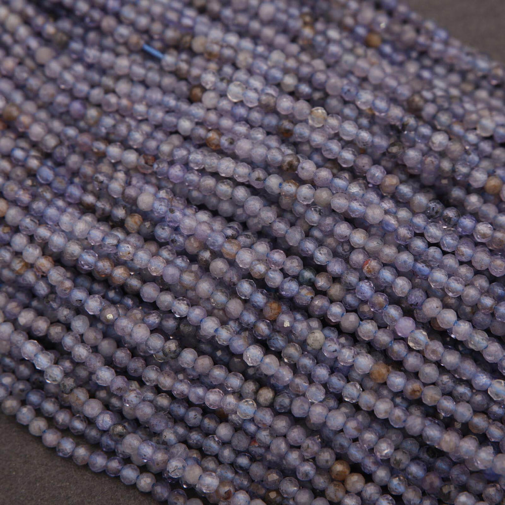 Close-up of blue beads on a dark background