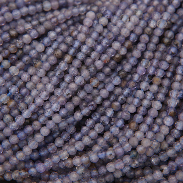 Close-up of purple beads with a textured surface
