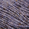 Close-up of small purple beads