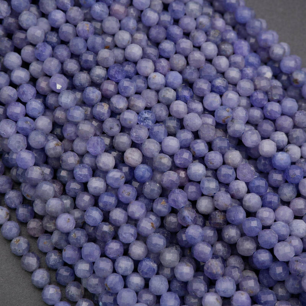 Close-up of purple beads on a gray background