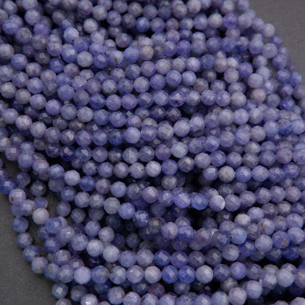 Close-up of purple beads on a dark background