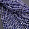 Close-up of blue beads on a dark background