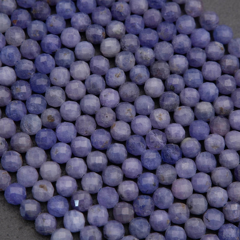 Close-up of purple beads on a dark background