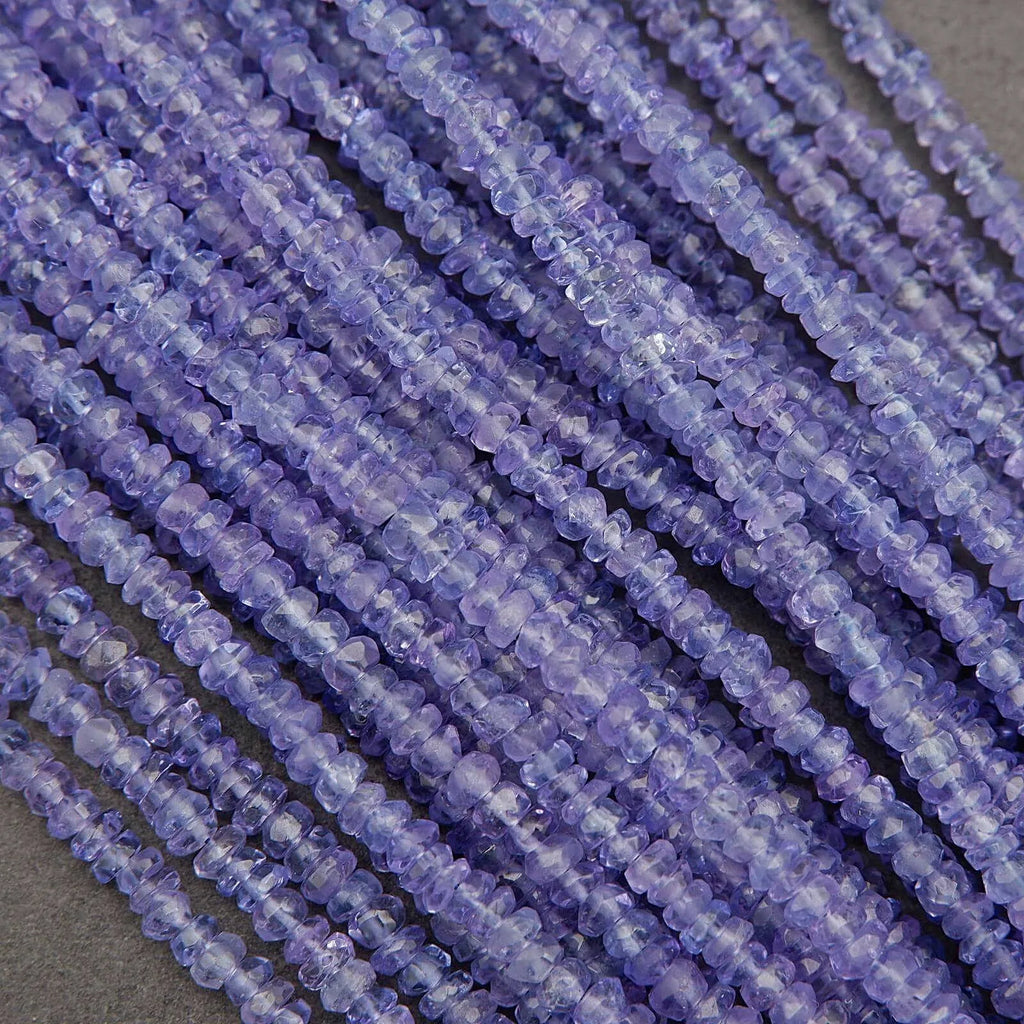Close-up of purple beads on a gray background