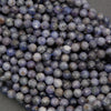 Blue-violet tanzanite beads with organic color variation