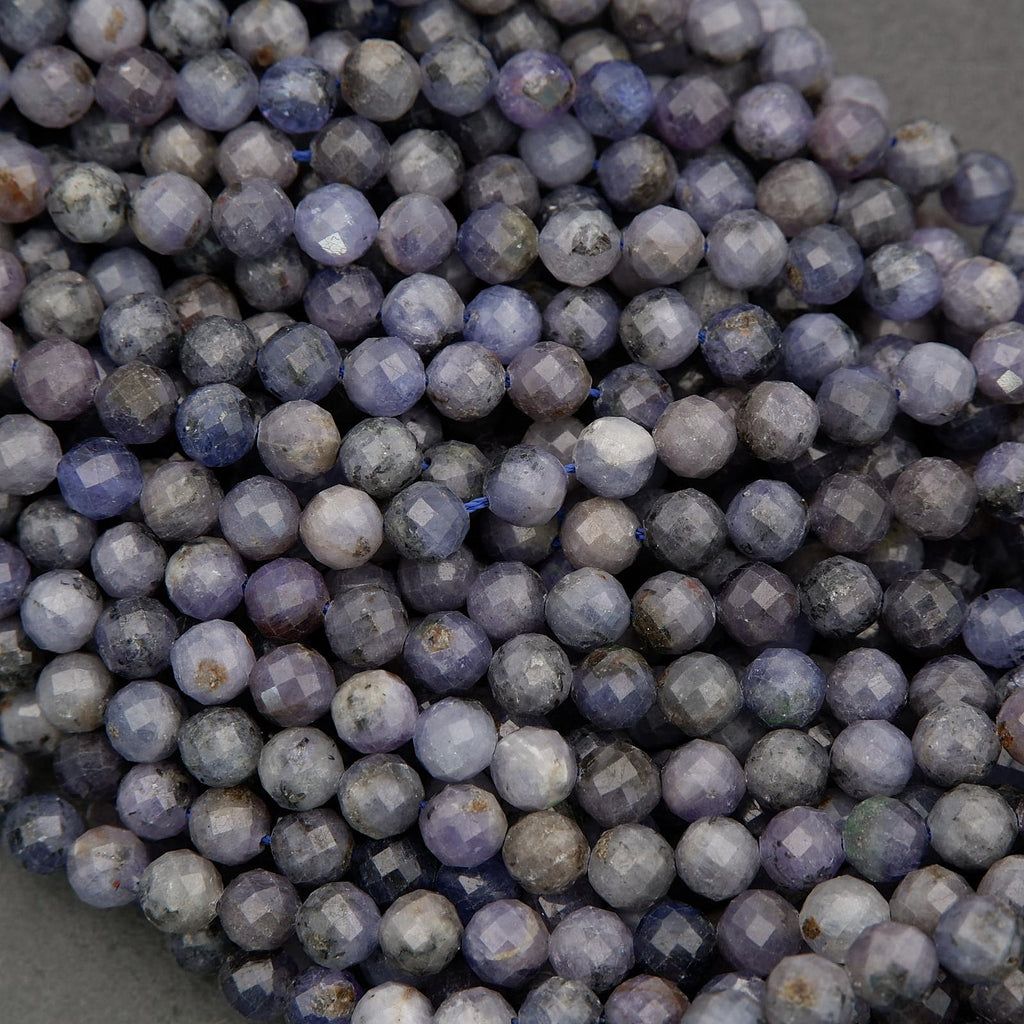 Blue-violet tanzanite beads with organic color variation