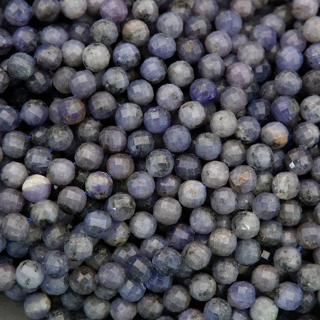 Faceted tanzanite beads with blue and violet tones
