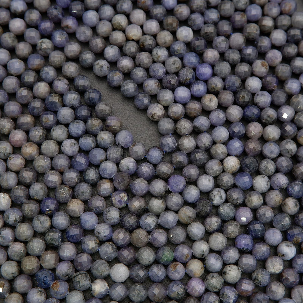 Included tanzanite gemstone beads with mixed blue shades