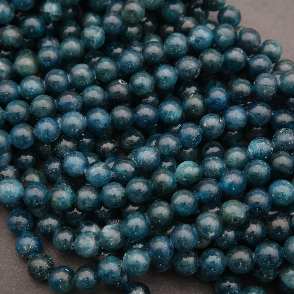 Close-up of blue beads on a dark background