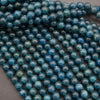 Close-up of blue beads on a gray background