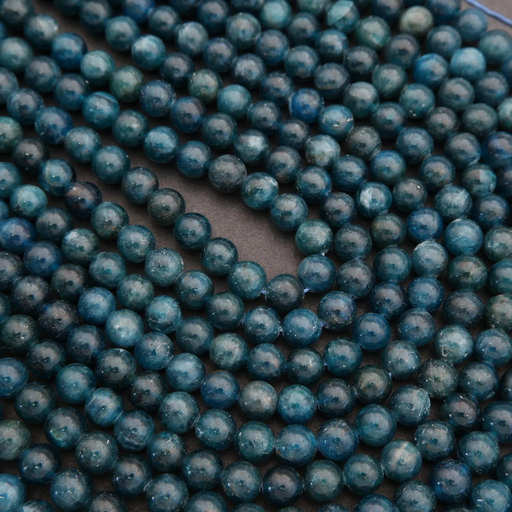Close-up of blue beads arranged in a circular pattern