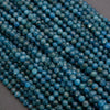 Close-up of blue beads on a gray background