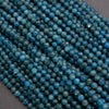 Close-up of blue beads on a gray background