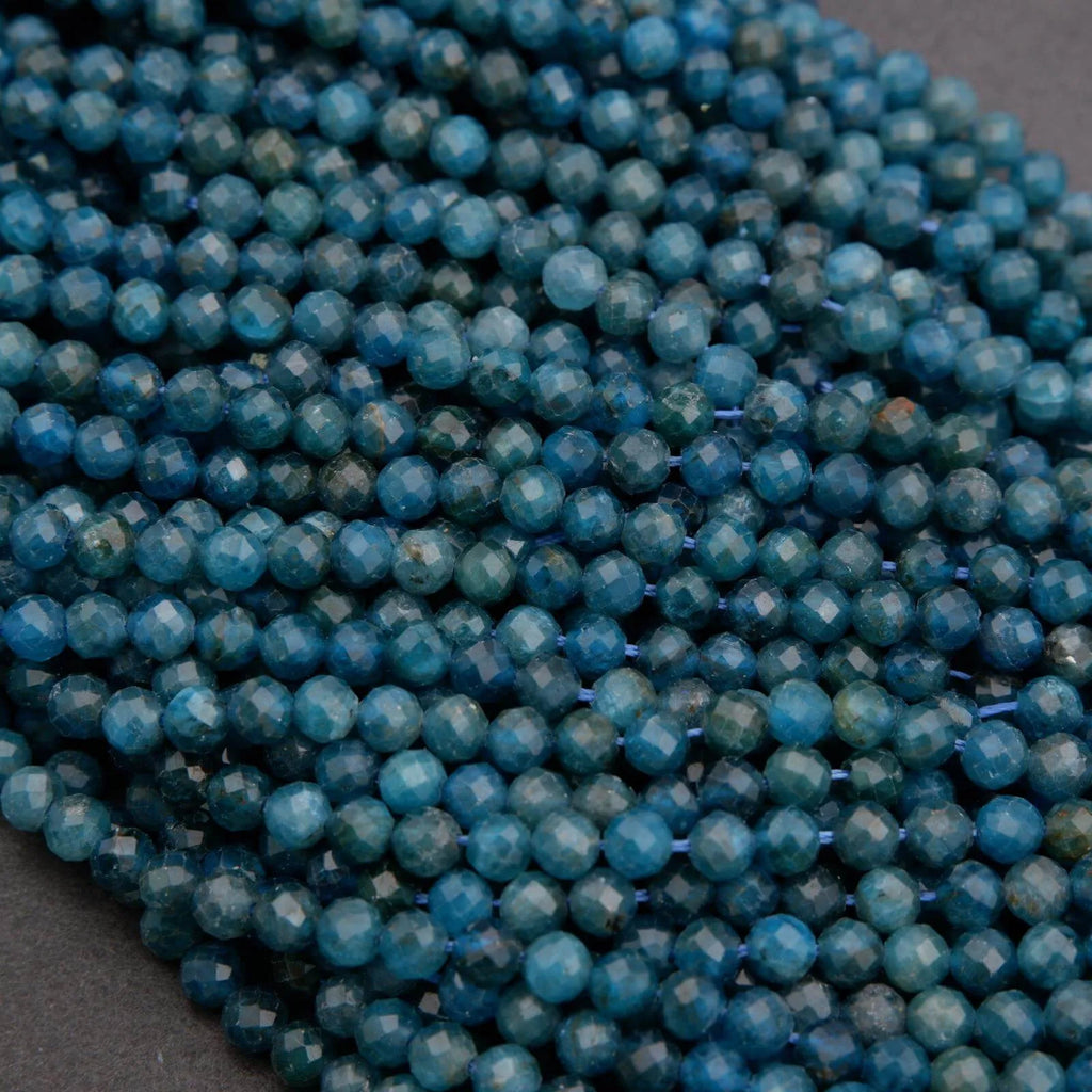 Close-up of blue beads on a dark background