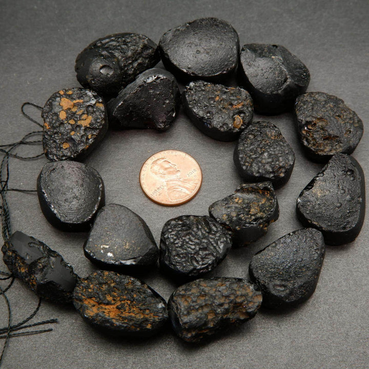 Black Tektite beads.