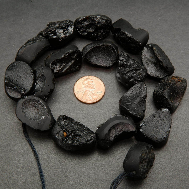 Black Tektite beads.