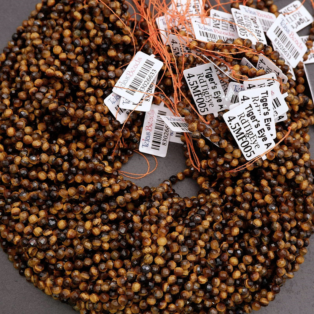 Beads with Tiger's Eye labels on a gray background