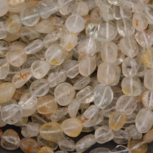 Close-up of translucent beads with visible imperfections