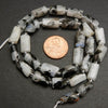 Tourmaline in moonstone beads.