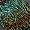 Close-up of multicolored bead strings on a dark background