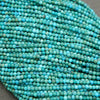 Small round turquoise beads with natural variation and earthy brown matrix