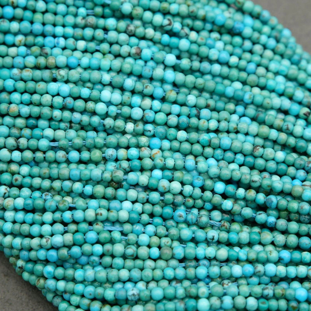 Small round turquoise beads with natural variation and earthy brown matrix