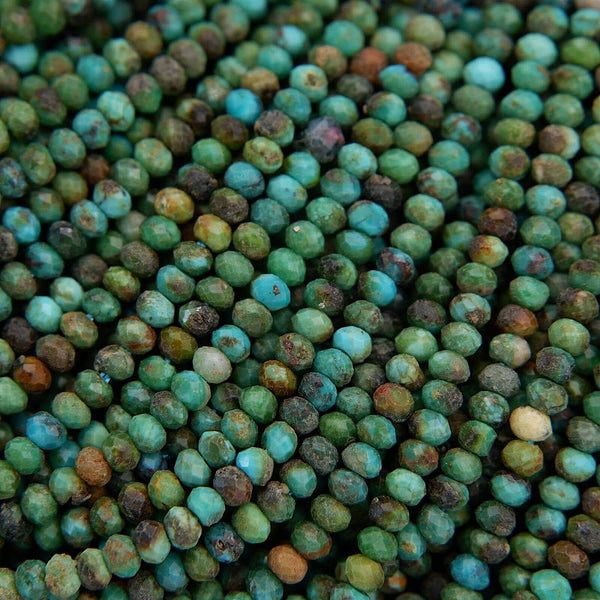 Close-up of green and brown peppercorns