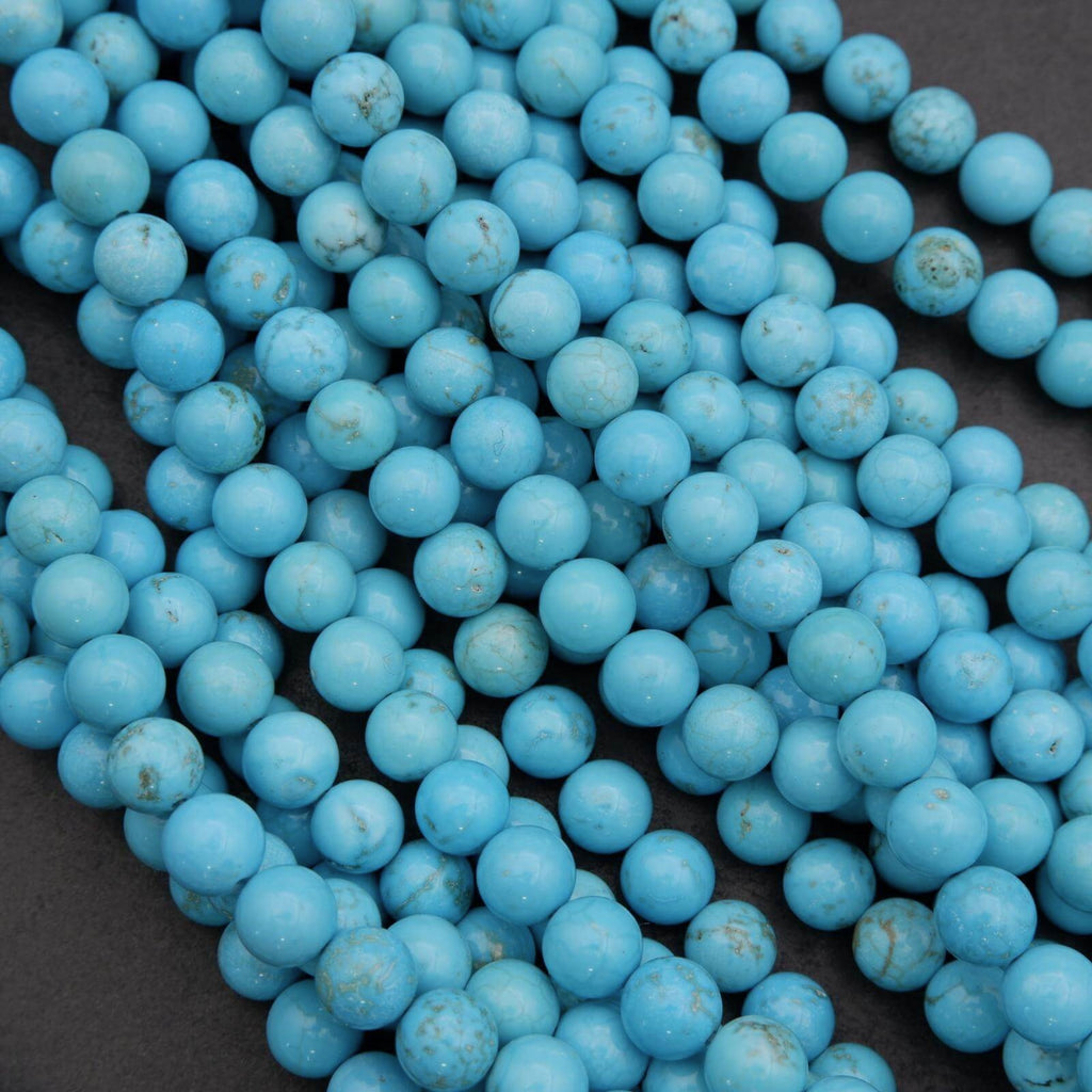 Close-up of blue beads on a dark background