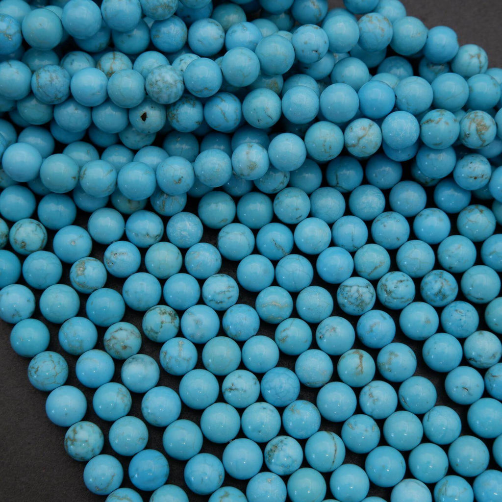 Close-up of blue beads on a dark background