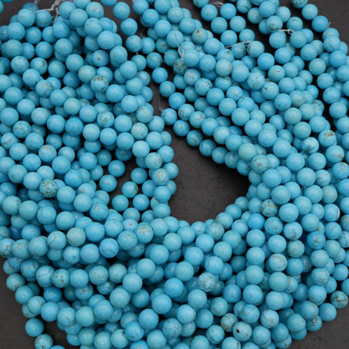 Close-up of blue beads on a dark background