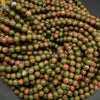 Green and pink unakite beads.