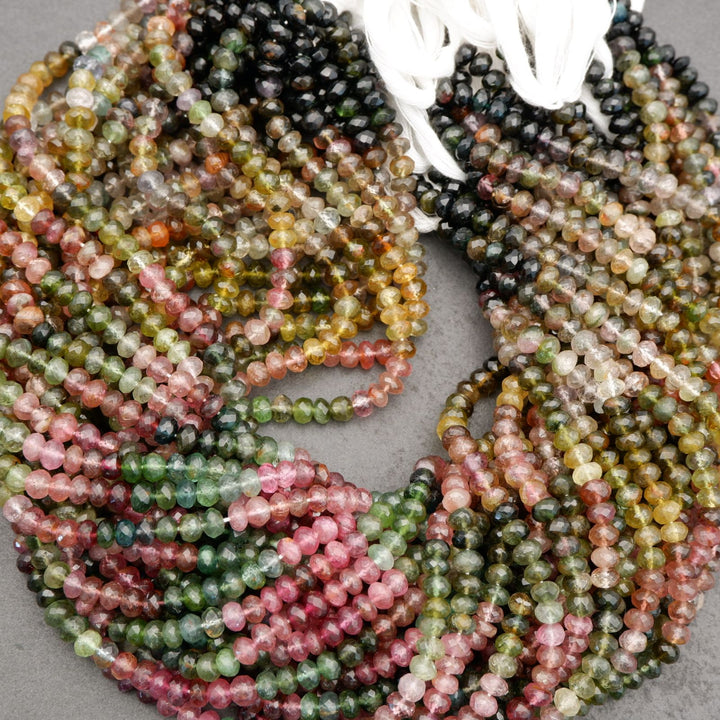 Pink green tourmaline round beads macro detail