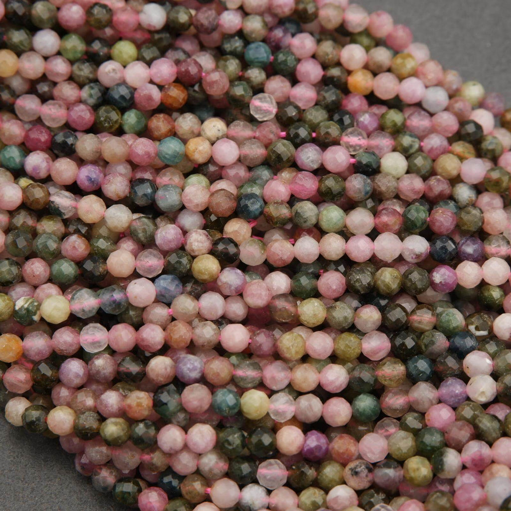 Close-up of multicolored round beads on a gray background