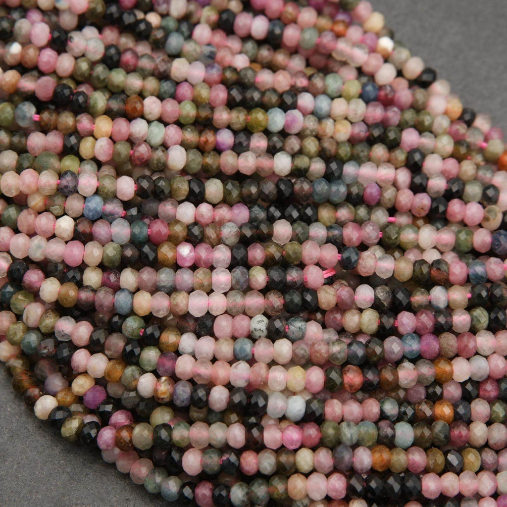 Close-up of multicolored beads on a gray background