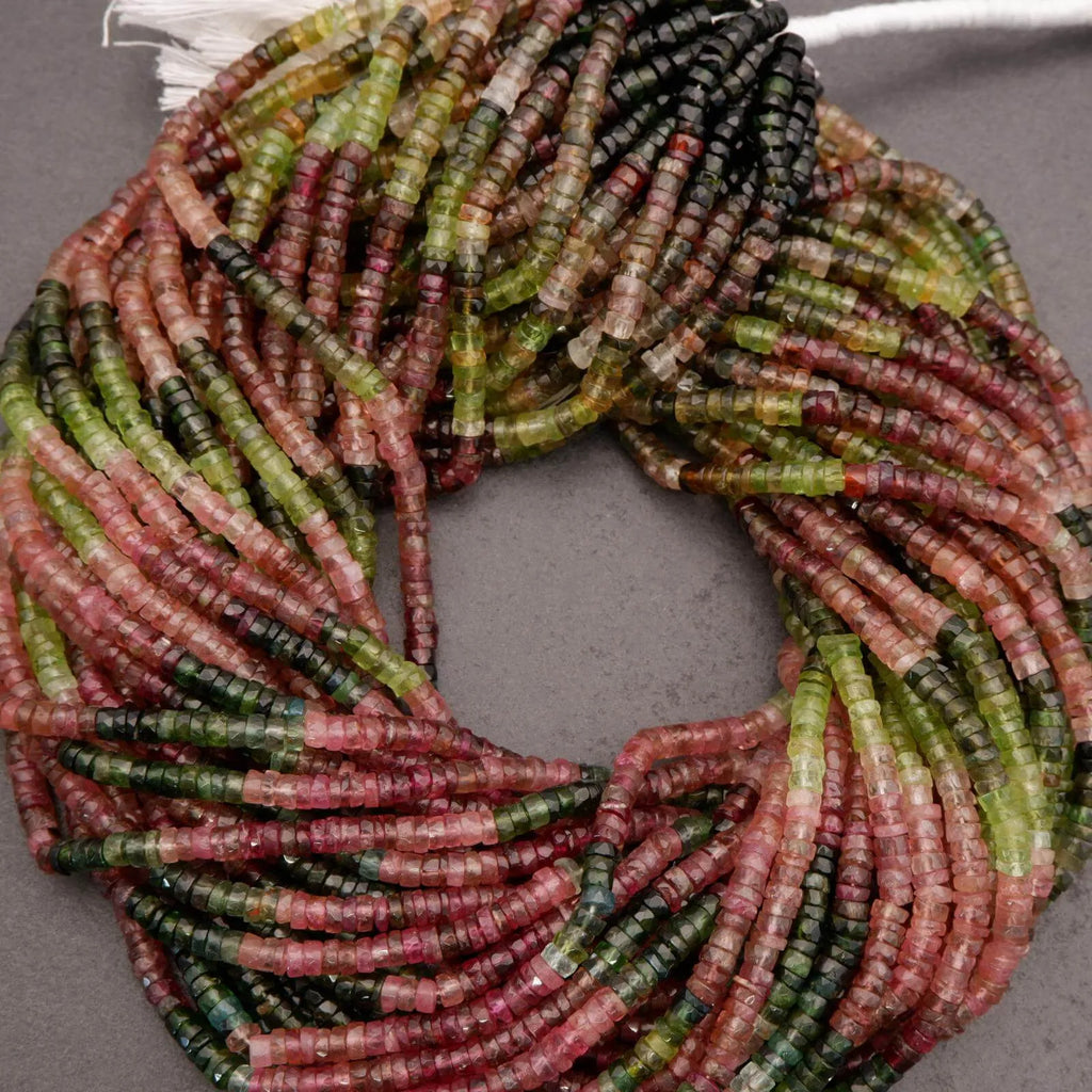 Close-up of a multicolored beaded necklace on a gray background