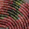 Close-up of multicolored beads arranged in a pattern